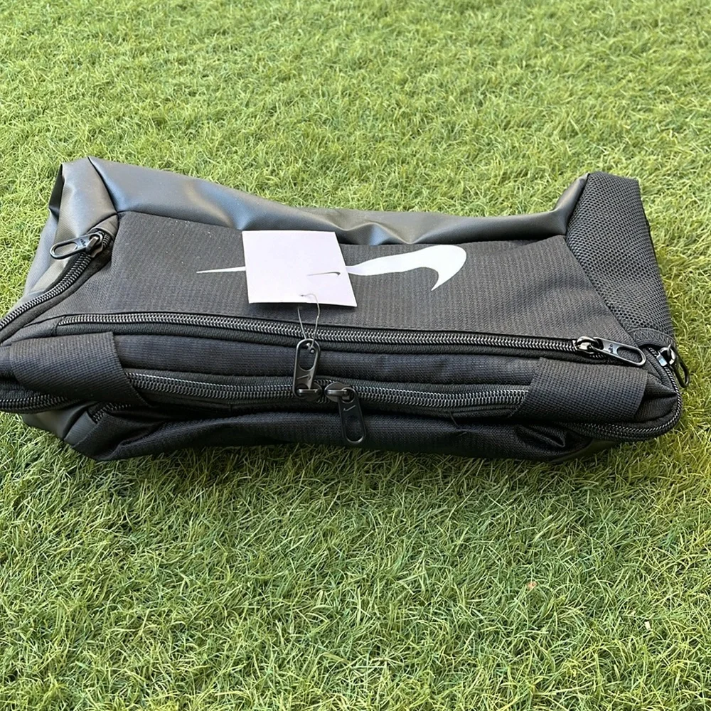 Nike check brand button
